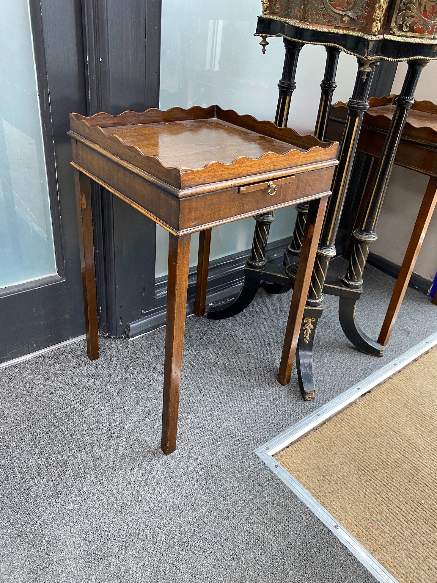 A pair of George III style gallery top mahogany bedside tables, width 35cm, height 58cm